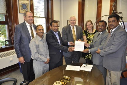 MU officials held a signing ceremony with K.S.R. Educational Institutions of India. Pictured, from L-R: Henry White, professor emeritus of physics; Raghuraman Kannan, MU assistant professor of radiology; R. Srinivasan, K.S.R. vice chancellor, international programs; Rob Duncan, MU vice chancellor for research; Annette Sobel, MU assistant to the provost for strategic opportunities; V. Rajendran, K.S.R. vice chancellor of research; K. Balaji, K.S.R. estate manager. 