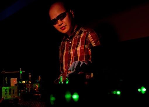 Vertical-cavity surface-emitting laser Colloidal quantum dots  nanocrystals  can produce lasers of many colors. Cuong Dang manipulates a green beam that pumps the nanocrystals with energy, in this case producing red laser light. Credit: Mike Cohea/Brown University 