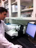 Mr Van Ortega, a graduate student in Professor Goss' lab operating the Malvern Instruments Zetasizer Nano DLS system.