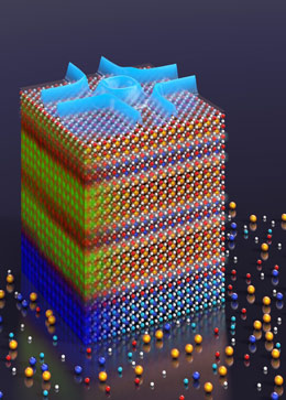 Provided/Kyle Shen
An artist's rendering of a transition metal oxide superlattice, with an actual transmission electron microscopy image superimposed on the left panel. The red is manganese, yellow is lanthanum and blue is strontium. The top is a Fermi surface map which illustrates how electrons move in the material.