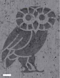 An atom-thick Rice Owl (scale bar equals 100 micrometers) was created to show the ability to make fine patterns in hybrid graphene/hexagonal boron nitride (hBN). In this image, the owl is hBN and the lighter material around it is graphene. The ability to pattern a conductor (graphene) and insulator (hBN) into a single layer may advance the ability to shrink electronic devices. (Credit: Zheng Liu/Rice University)