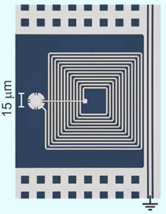 Colorized image of NIST micro-drum and circuit on a sapphire backing. JILA researchers demonstrated that the drum might be used as a memory device in future quantum computers.
Credit: Teufel/NIST