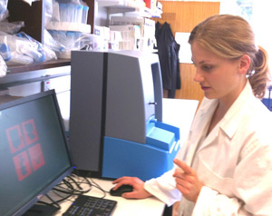 Michelle Levene, a PhD student of the Clinical Sciences Division at St Georges uses the NanoSight LM10 NTA system used to characterize proteins and peptides.