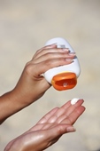 Using a particular type of titanium dioxide in sunblock and cosmetics could reduce the potential health risks associated with the widely used compound.
Credit: Hemera/Thinkstock