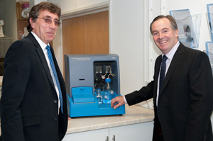 CEOs Paul Walker of Malvern and Jeremy Warren of NanoSight with the NS500 NTA system.
