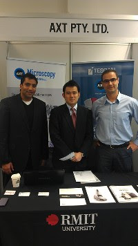The AXT stand at SPIE manned by Kamran Khajehpour and Nav Dhaliwal from AXT and Hirro Fujino from Hirox.