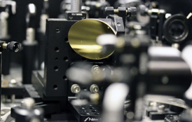 A THz spectrometer driven by femtosecond laser pulses was used to demonstrate THz emission from a split-ring resonator metamaterial
of single nanometer thickness.