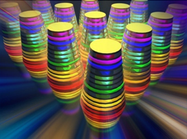 The image shows a multilayered waveguide taper array. The different wavelengths, or colors, are absorbed by the waveguide tapers (thimble-shaped structures) that together form an array.