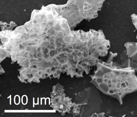 Particles of nitrogen-containing porous carbon are able to capture carbon dioxide from natural gas under pressure at a wellhead by polymerizing it, according to researchers at Rice University. When the pressure is released, the carbon dioxide returns to gaseous form.Credit: Tour Group/Rice University