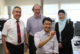 From right: IBNs Prof. Jackie Y. Ying, Dr. Jinhua Yang (seated), with Hydro-Qubecs Dr. Michel Trudeau and Dr. Karim Zaghib. 