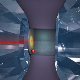 This is an artist's rendition of the high pressure thermal conductance experiment in a diamond anvil cell. The flat tips of the diamond anvils are less than half a millimeter in diameter, and the metal film (gray), ruby sphere (red), and pressure medium (blue fluid) are sealed between the diamonds by a metal gasket (solid purple).
CREDIT: Alex D. Jerez Roman, Visualization Laboratory, Beckman Institute, University of Illinois.
