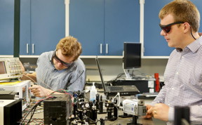 Oak Ridge National Laboratory researchers Raphael Pooser (left) and Benjamin Lawrie have used quantum correlated beams of light to reach unprecedented levels of detection from microcantilever-based sensors.
CREDIT: ORNL