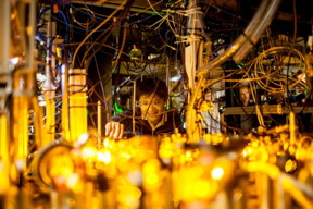 Graduate student Lawrence Cheuk adjusts the optics setup for laser cooling of sodium atoms.

Photo: Jose-Luis Olivares/MIT