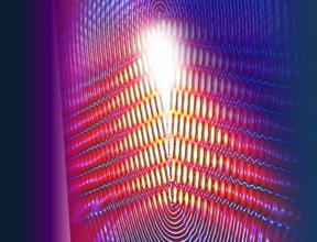 This is an artistic rendition of the superluminal running wave of charge that excites the surface plasmon wakes.
CREDIT: Daniel Wintz, Patrice Genevet, and Antonio Ambrosio.