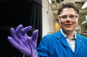 Kjeld Janssen and a nanofluidic device, also known as a lab-on-a-chip Photo Credit: Sonia Fernandez
