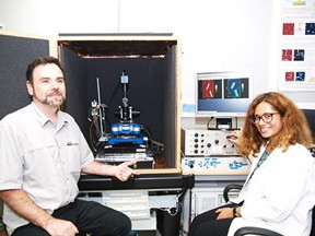 Dr Christophe Demaille and PhD student, Ccilia Taofifenua, in front of the JPK NanoWizard-based AFM-SECM set up developed at the Universit Paris Diderot.