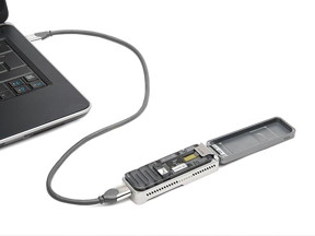 Oxford Nanopore's MinION USB-attached miniature sensing device.
CREDIT: Oxford Nanopore Technologies