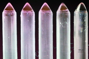 External row of seven emitters that are part of a 49-emitter array. The scalloping on the exterior of the emitters, due to the layer-by-layer manufacturing, is visible.

Image: Anthony Taylor and Luis F Velsquez-Garca (edited by MIT News)