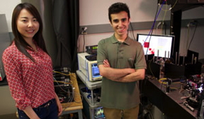 UCLAs Claire Lifan Chen and Ata Mahjoubfar with the new device, which can image cancer cells extremely quickly and without damaging blood samples.Credit: Tunde Akinloye/CNSI