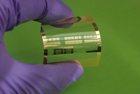 Using a unique method they developed, a team of UW�Madison engineers has fabricated the world�s fastest silicon-based flexible transistors, shown here on a plastic substrate. COURTESY OF JUNG-HUN SEO