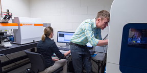 Users from the Virginia Ferguson Laboratory at the University of Colorado Boulder work with the Renishaw inVia Raman system interfaced to the Hysitron TriboIndenter system