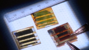 Three types of large-area solar cells are made out of two-dimensional perovskites. At left, a room-temperature cast film; upper middle is a sample with the problematic band gap, and at right is the hot-cast sample with the best energy performance.
CREDIT: Los Alamos National Laboratory