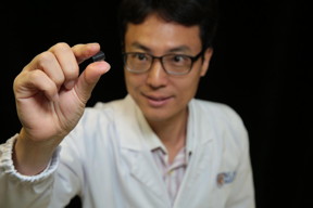 Associate Professor Yang Hyunsoo from the National University of Singapore, who led a research team to successfully embed a powerful magnetic memory chip on a plastic material, demonstrating the flexibility of the memory chip.
CREDIT: National University of Singapore