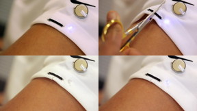Nanoengineers printed a self-healing circuit on the sleeve of a T-shirt and connected it with an LED light and a coin battery. The researchers then cut the circuit and the fabric it was printed on. At that point, the LED turned off. But then within a few seconds it started turning back on as the two sides of the circuit came together again and healed themselves, restoring conductivity.
CREDIT
Jacobs School of Engineering/UC San Diego
