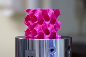3-D-printed gyroid models such as this one were used to test the strength and mechanical properties of a new lightweight material.

Photo: Melanie Gonick/MIT