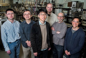 Mengjin Yang (left), Kai Zhu, Ye Yang, Matt Beard, David Moore and Elisa Miller are co-authors of a new paper in Nature Energy about perovskites. Photo by Dennis Schroeder / NREL