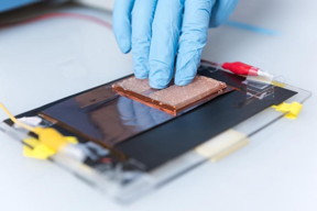 A proof of concept triboelectric nanogenerator produces electrical charges for a mass spectrometer. Georgia Tech researchers have shown that replacing conventional power supplies with TENG devices for charging the molecules being analyzed can boost the sensitivity of mass spectrometers to unprecedented levels. 

Credit: Rob Felt, Georgia Tech