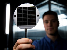 A graduate student at BYU holds up a disc of microchips that have flexible glass membranes.
CREDIT
Jaren Wilkey/BYU Photo
