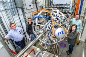 Brookhaven scientists are pictured at NSLS-II beamline 8-ID, where they used ultra-bright x-ray light to "see" the chemical complexity of a new catalytic material. Pictured from left to right are Klaus Attenkofer, Dong Su, Sooyeon Hwang, and Eli Stavitski.