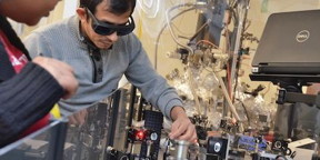 University of Kansas graduate student Tika Kafle (facing camera) working on the time-resolved photoemission spectroscopy setup.

CREDIT
Cody Howard / University of Kansas