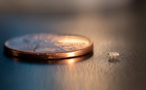 A micro-bristle-bot is shown next to a US penny for size comparison.

CREDIT
Allison Carter, Georgia Tech