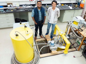 Vikram Deshpande, assistant professor in the Department of Physics & Astronomy (left) and doctoral candidate Su Kong Chong (right) stand in the "coolest lab on campus." Deshpande leads a lab that can cool topological materials down to just a few fractions of a degree above absolute zero at -273.15C (-459.67F). It is literally the coldest laboratory on campus.

CREDIT
Lisa Potter/University of Utah