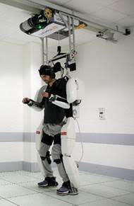 The four-limb exoskeleton controlled by the patient during the BCI project at Clinatec Clinatec