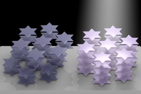 Atoms in the crystal lattice of tantalum disulfide arrange themselves into six-pointed stars that can be manipulated by light, according to Rice University researchers. The phenomenon can be used to control the material�s refractive index. It could become useful for 3D displays, virtual reality and in lidar systems for self-driving vehicles. (Credit: Weijian Li/Rice University)