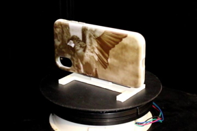 A new system uses UV light projected onto objects coated with light-activated dye to alter the reflective properties of the dye, creating images in minutes.

CREDIT
Image courtesy of Michael Wessley, Stefanie Mueller, et al