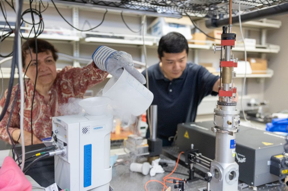 Giti Khodaparast (at left) and Wei Zhou in the Nonlinear Spectroscopy Lab in ICTAS II on Virginia Tech's Blacksburg campus. Photo by Chelsea Seeber for Virginia Tech.